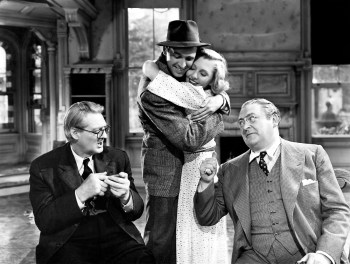 Lionel Barrymore, James Stewart, Jean Arthur, and Edward Arnold in the film of You Can't Take It With You.